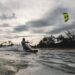 a man kiteboarding in the sea