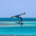 kitesurfing teenager on sea shore